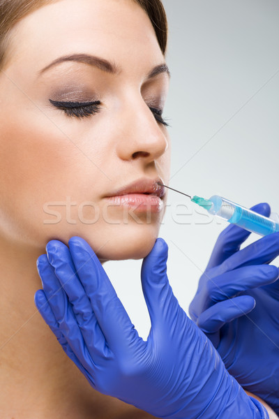 Beautiful, flawless female face - plastic surgery, lip augmentation Stock photo © Geribody
