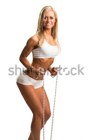 Lövés vonzó nő visel edzés ruházat törölköző Stock fotó © Geribody