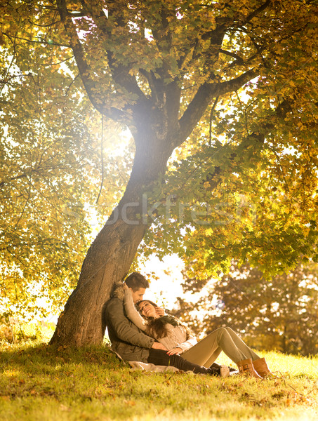 Passionate love in the park under a tree Stock photo © Geribody