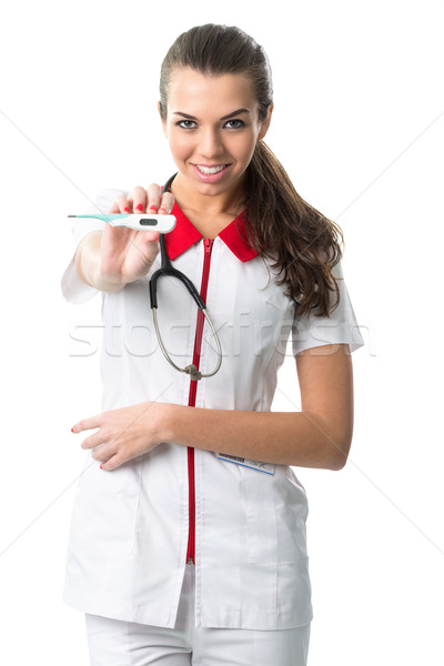 Belo enfermeira vestir termômetro sorrir Foto stock © Geribody