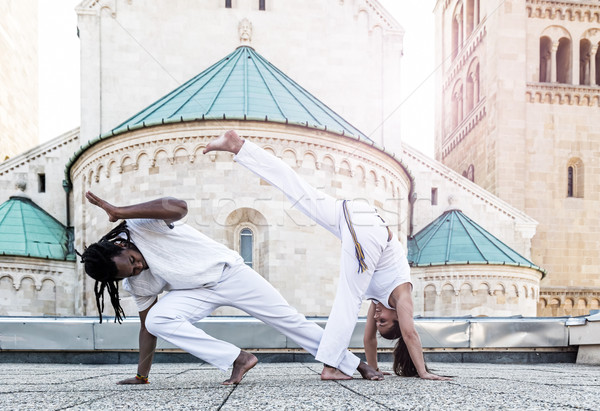 Young pair capoeira partnership ,spectacular sport Stock photo © Geribody