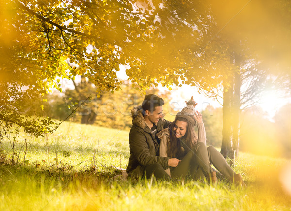 Szczęśliwy para drzewo jesienią parku niebo Zdjęcia stock © Geribody