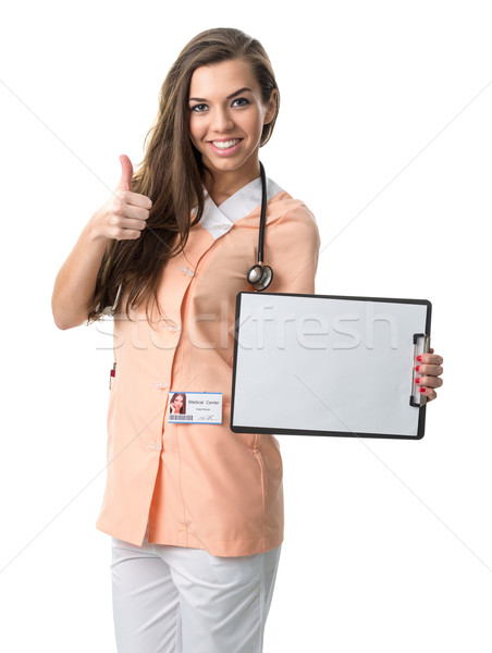 Piękna pielęgniarki folderze sukces Zdjęcia stock © Geribody