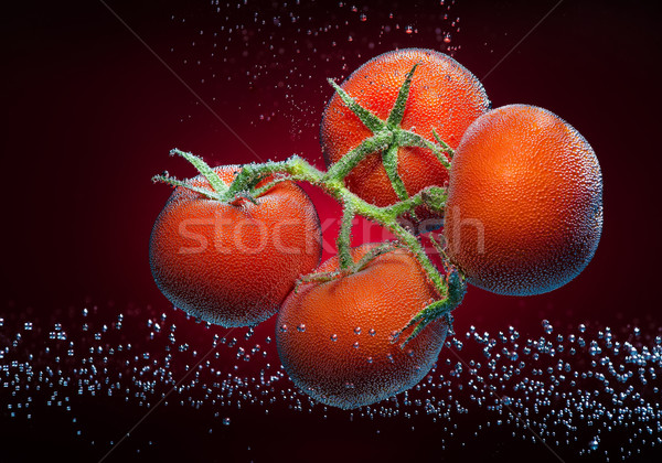 Tomatoes with bubbles Stock photo © Geribody