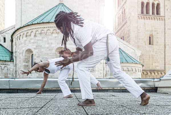 Fiatal pár capoeira együttműködés látványos sport Stock fotó © Geribody