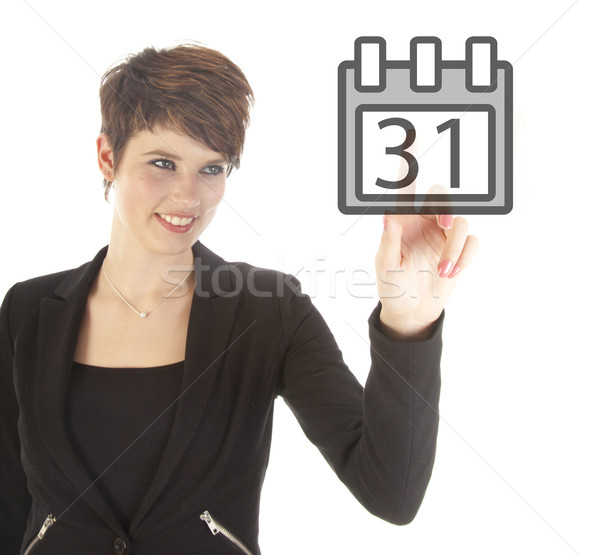 Young businesswoman with calender isolated on white background Stock photo © gigra