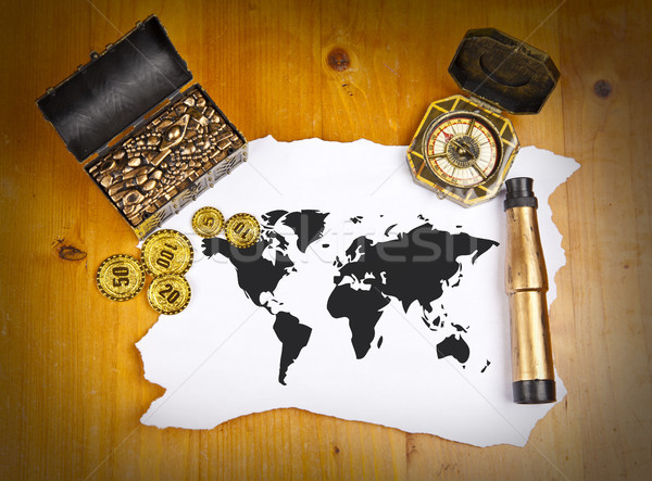Stock photo: Pirate world map with treasure, compass and binocular