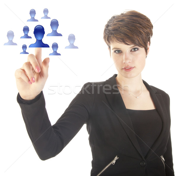 Young woman selecting blue virtual friends isolated on white background Stock photo © gigra