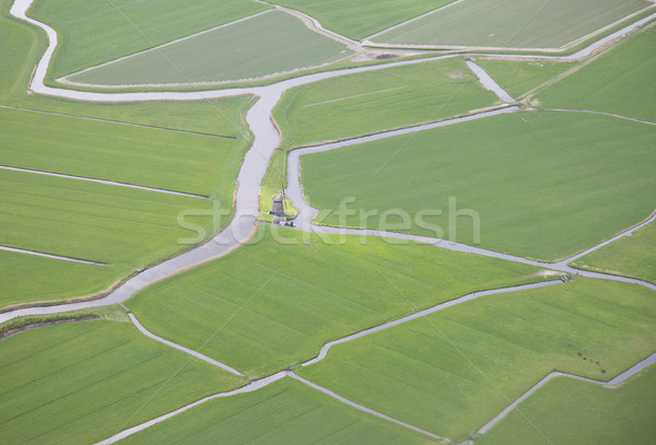 Green landscape with water and windmill from above, The Netherlands Stock photo © gigra