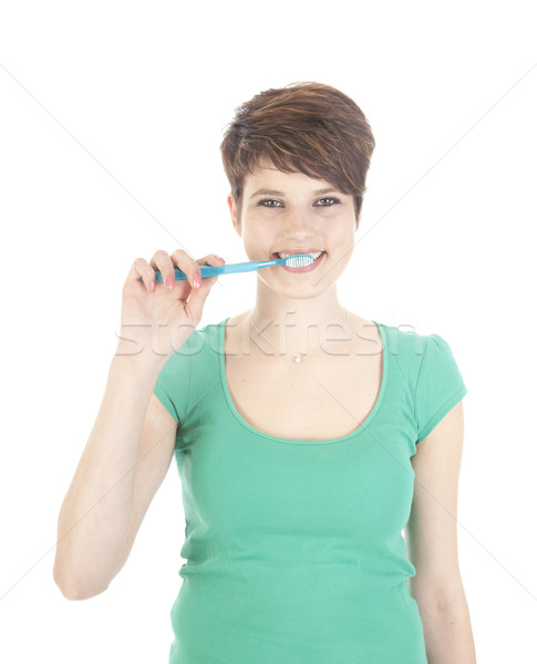 Jonge vrouw tandenborstel geïsoleerd witte vrouw glimlach Stockfoto © gigra