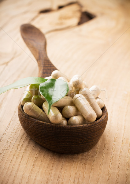Alternatív gyógymód fakanál zöld levél étel természet egészség Stock fotó © gitusik