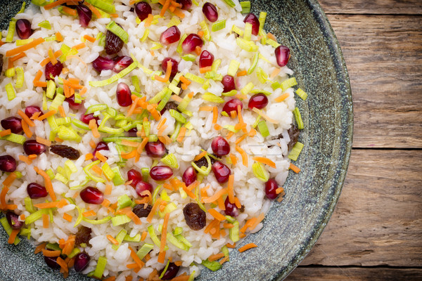 Melograno risotto riso piatto uvetta cibo vegetariano Foto d'archivio © gitusik