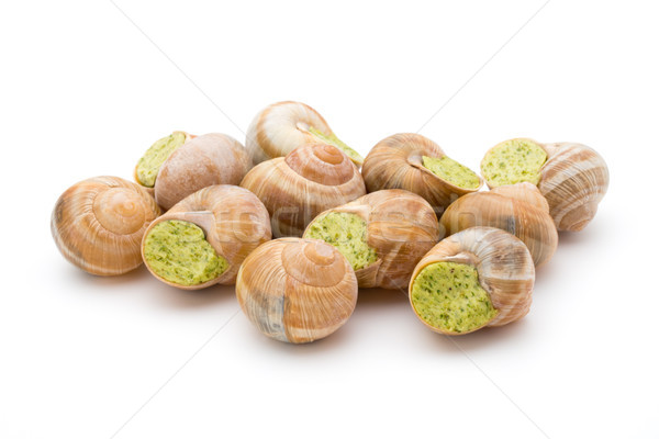 Stock photo: Cooked snails delicacy. French cuisine stuffed snails.