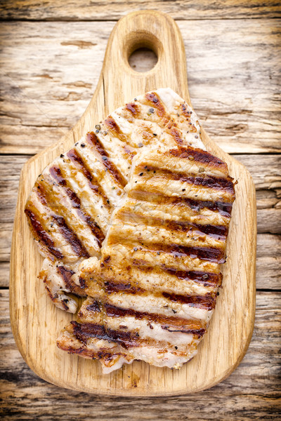 Grilled pork chops pieces. Spices and rosemary. Stock photo © gitusik