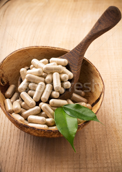 Alternatív gyógymód fakanál zöld levél étel természet egészség Stock fotó © gitusik