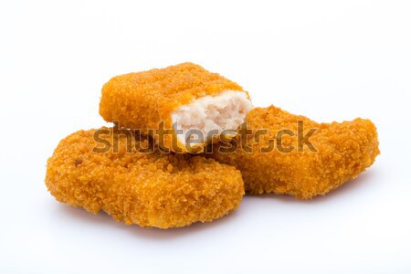 Nugget chiken on the white background. Stock photo © gitusik