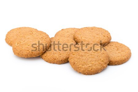 Stacked short pastry cookies isolated on white background. Stock photo © gitusik