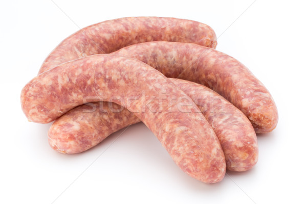 Raw sausage with parsley leaf isolated on white background. Stock photo © gitusik