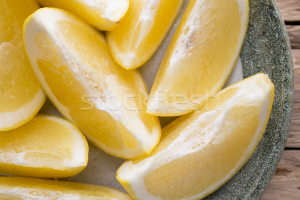 Citromsárga grapefruit szelet tányér kereszt gyümölcs Stock fotó © gitusik