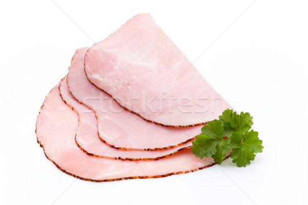Thin slices of ham on white background. Stock photo © gitusik
