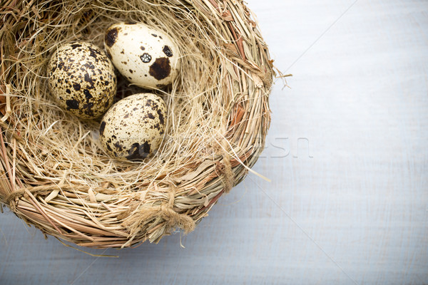 Stock photo: Quail eggs. Easter greeting card.