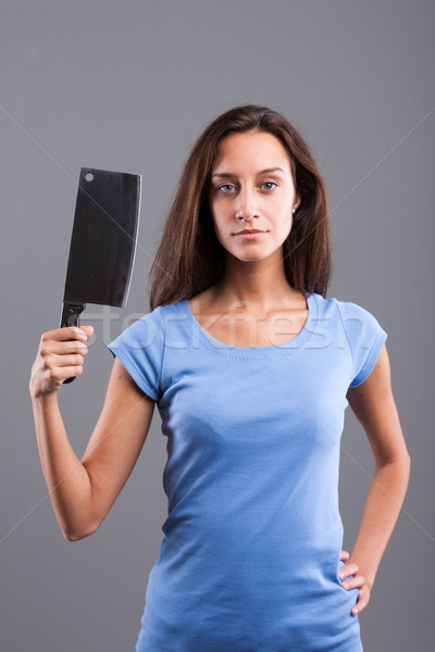 woman with meat cleaver on a blue shirt Stock photo © Giulio_Fornasar