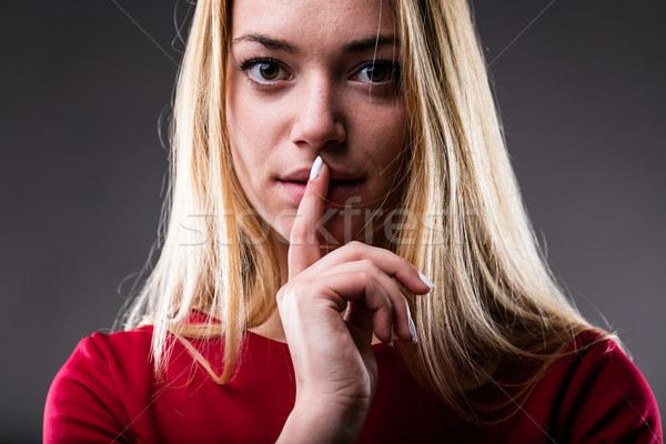 woman with finger on her lips Stock photo © Giulio_Fornasar