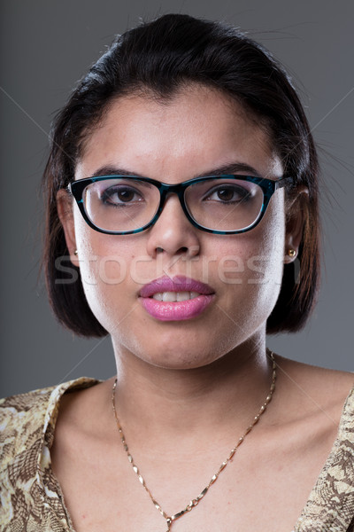 Nő szemüveg bámul kamera szabvány portré Stock fotó © Giulio_Fornasar