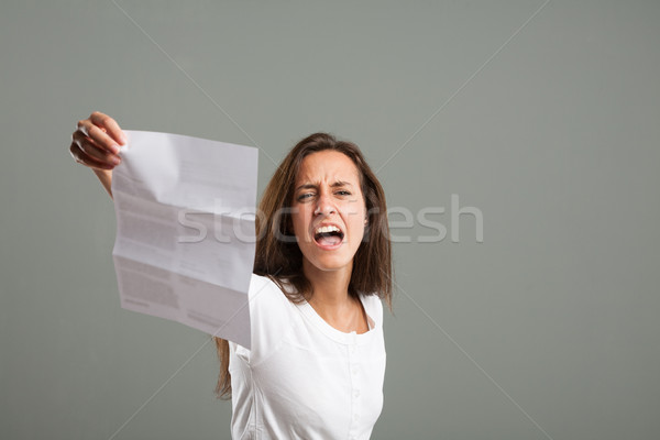 Young woman throwing a temper tantrum Stock photo © Giulio_Fornasar