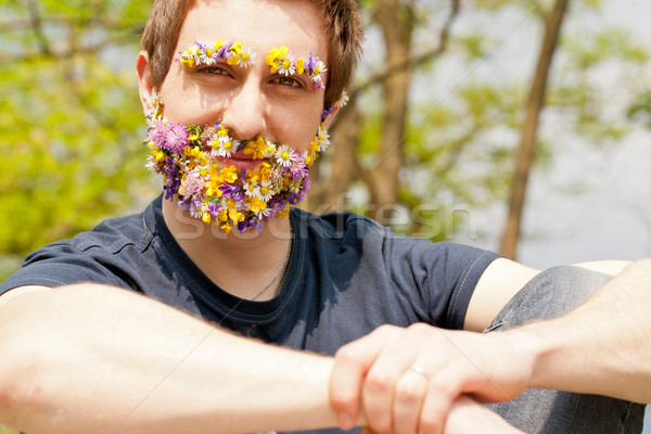 Man bloemen gedekt gezicht jonge Stockfoto © Giulio_Fornasar