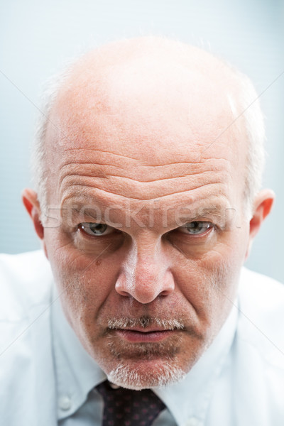 bad worker frowning at camera Stock photo © Giulio_Fornasar