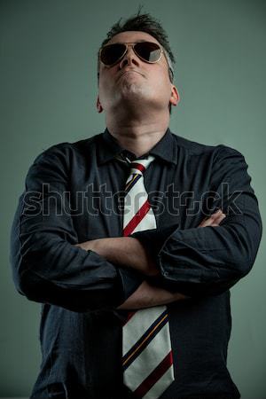 Stock photo: manager standing with his amrs folded in military style