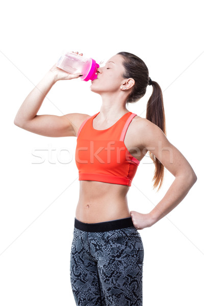 drinking before after and during her workout Stock photo © Giulio_Fornasar