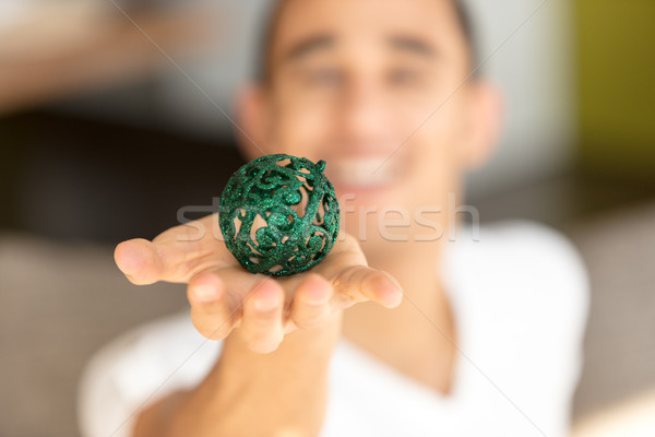 Stock photo: Green ball on palm