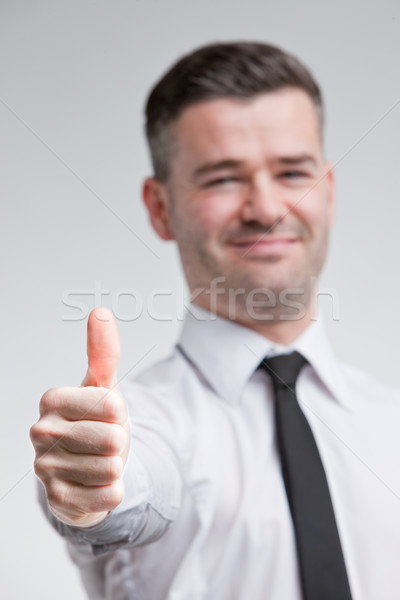 thumb up for happy young man Stock photo © Giulio_Fornasar