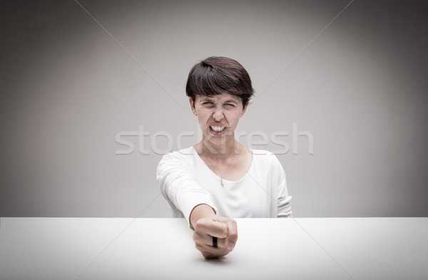 Zły kobieta pięść tabeli silne wściekłość Zdjęcia stock © Giulio_Fornasar