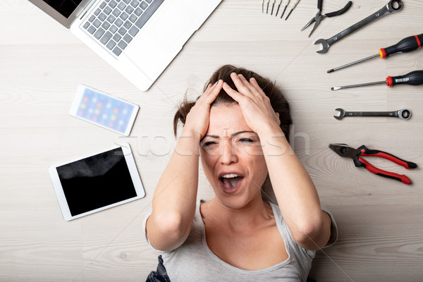 Stressed woman yelling with her hands to her hair Stock photo © Giulio_Fornasar
