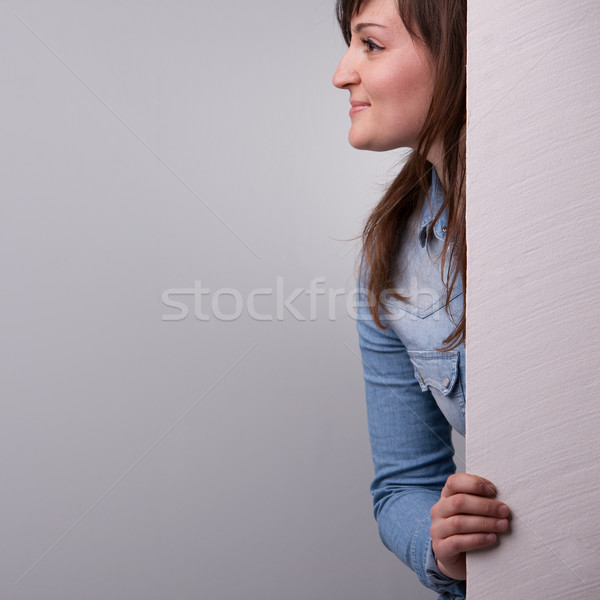 Profil femeie in sus in spatele perete Imagine de stoc © Giulio_Fornasar