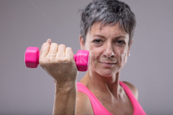 Fit determined woman working out with weights Stock photo © Giulio_Fornasar