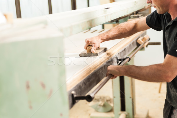shaving with plane on woodworker workshop Stock photo © Giulio_Fornasar