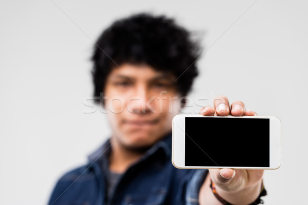man showing smartphone screen to you Stock photo © Giulio_Fornasar