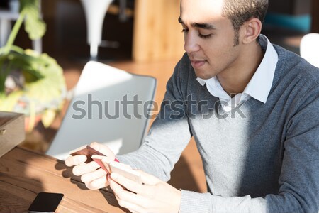 Man looking at veneer sheets Stock photo © Giulio_Fornasar