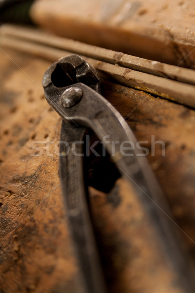 pincers on a retro wooden surface Stock photo © Giulio_Fornasar