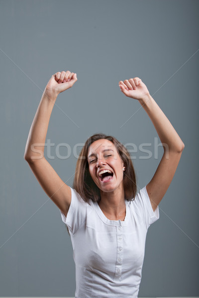 nice woman exulting and laughing rising arms up Stock photo © Giulio_Fornasar