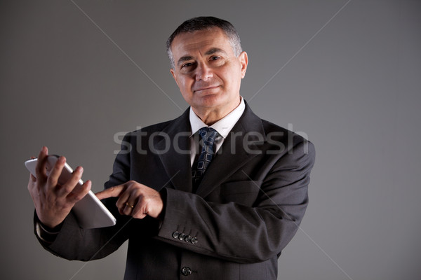 old man using a digital tablet Stock photo © Giulio_Fornasar