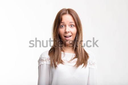 Surprised young woman with wide eyes Stock photo © Giulio_Fornasar