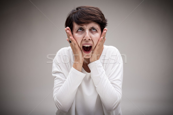 woman making the scream icon face Stock photo © Giulio_Fornasar
