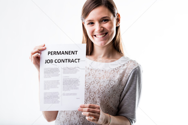 woman proudly holding her job contract Stock photo © Giulio_Fornasar