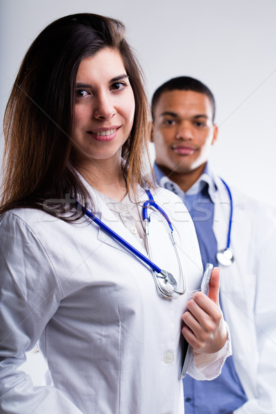 doctors with welcoming smiles waiting for you Stock photo © Giulio_Fornasar