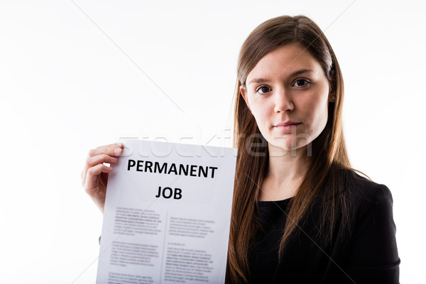 woman proudly holding her job contract Stock photo © Giulio_Fornasar
